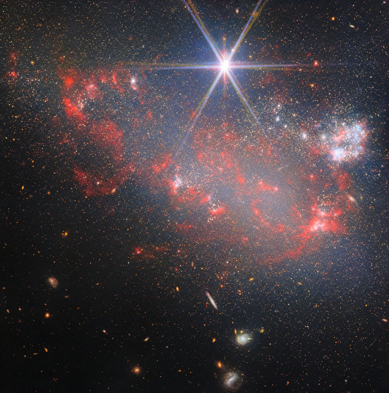 不规则星系 Arp 263 中散布着明亮星团与块状恒星形成区